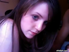 Blue Eyed Brunette Making A Fine  In A Webcam Video